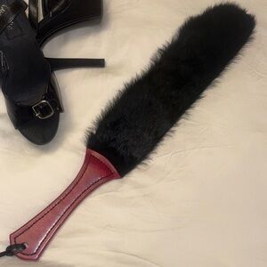 Black Fur Paddle with Red Handle